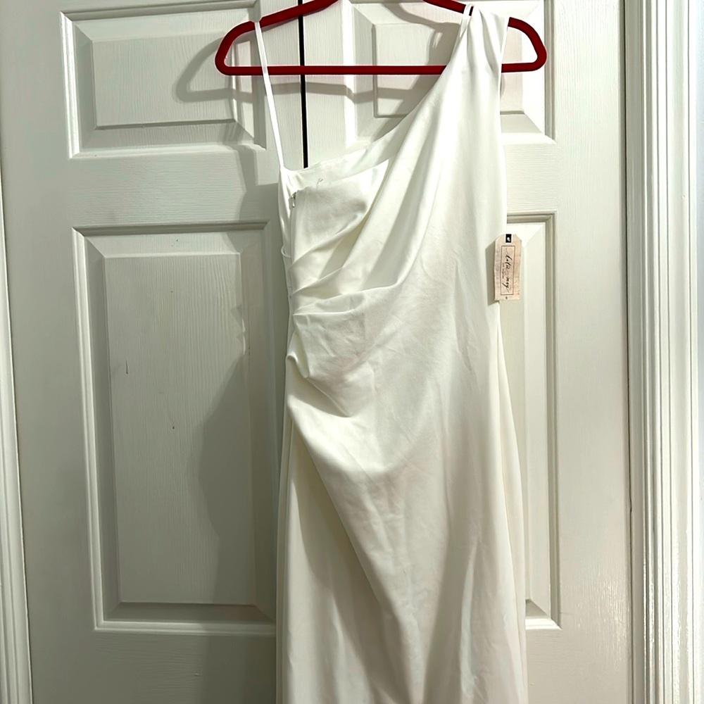 One shoulder white wedding dress with back waist peekaboo.